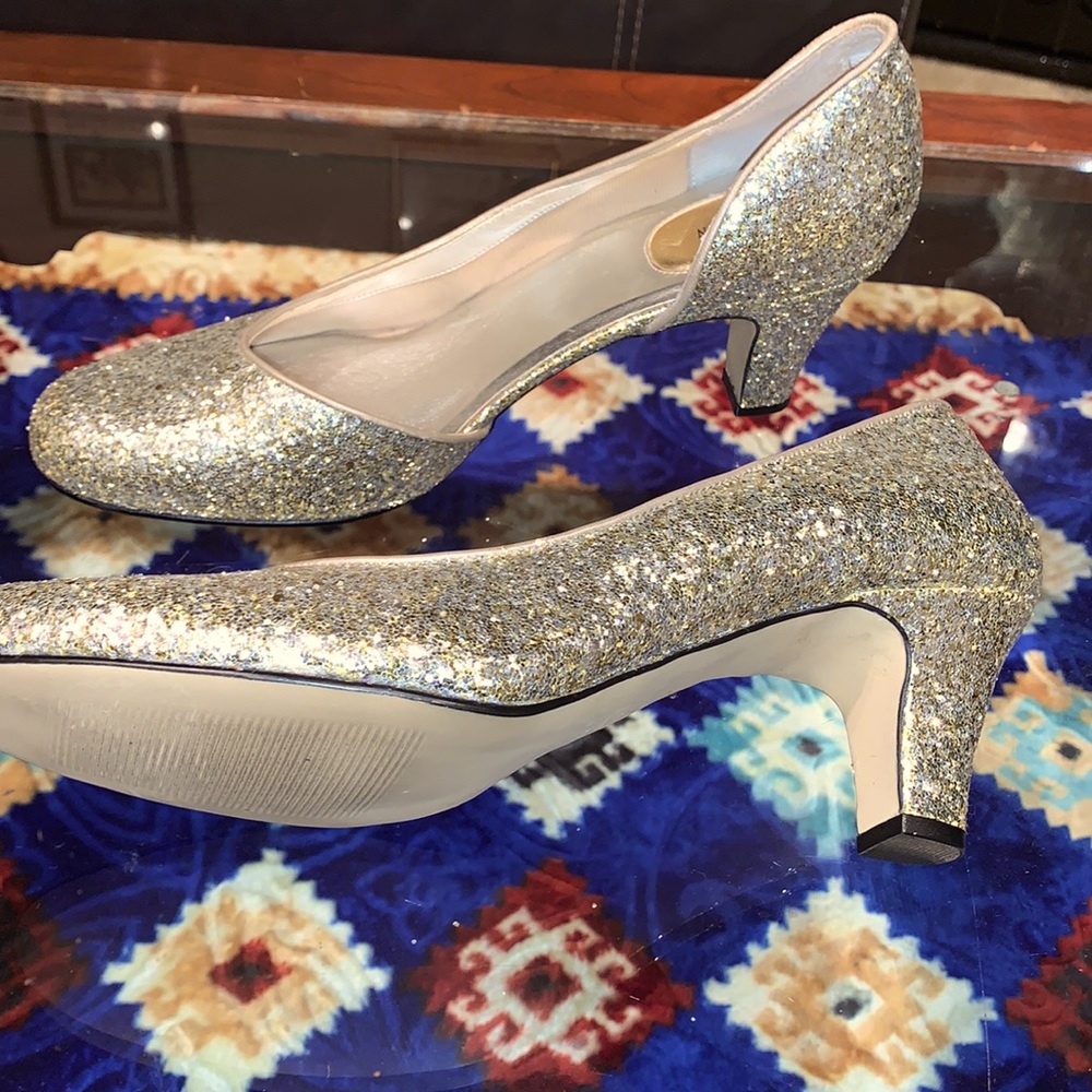 A glittering gold shoe